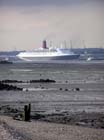  QE2 Comes Into View With Beach